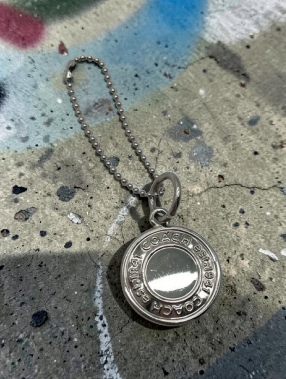 Coach Polished Silver-Tone Medallion Hang Tag